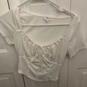 Cropped white silky top